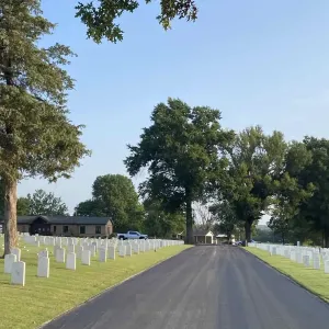 The finished main drive through the cemetery after paving and turf restoration