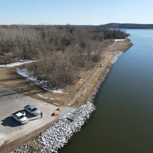 Aerial of the completed shoreline revetment and trail running along the reservoir