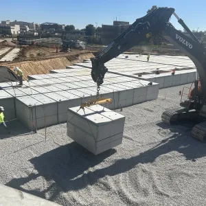 Waterproofing membrane laid over placed crypts